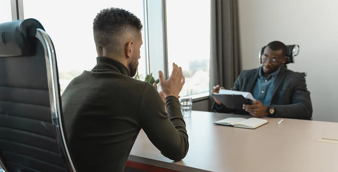 Reference check interview between hiring professional and candidate