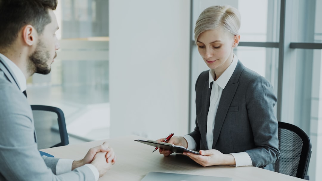 HR professional reviewing employment verification report