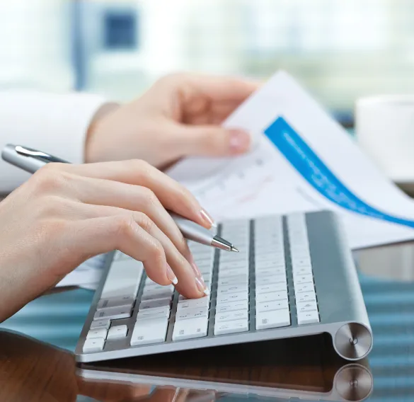 Tablet on a desk. Brand protection and identity safety. Suggested replacement: warm editorial lighting, clean desk with documents.